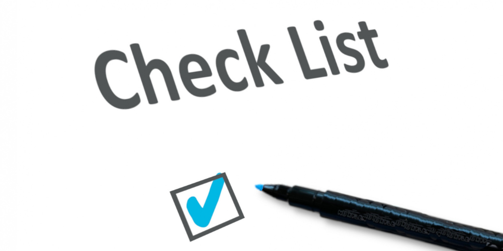「Check List」の文字とチェック済み枠、黒ペン